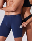 Couple using pocket in navy blue boxer briefs to store condom discreetly