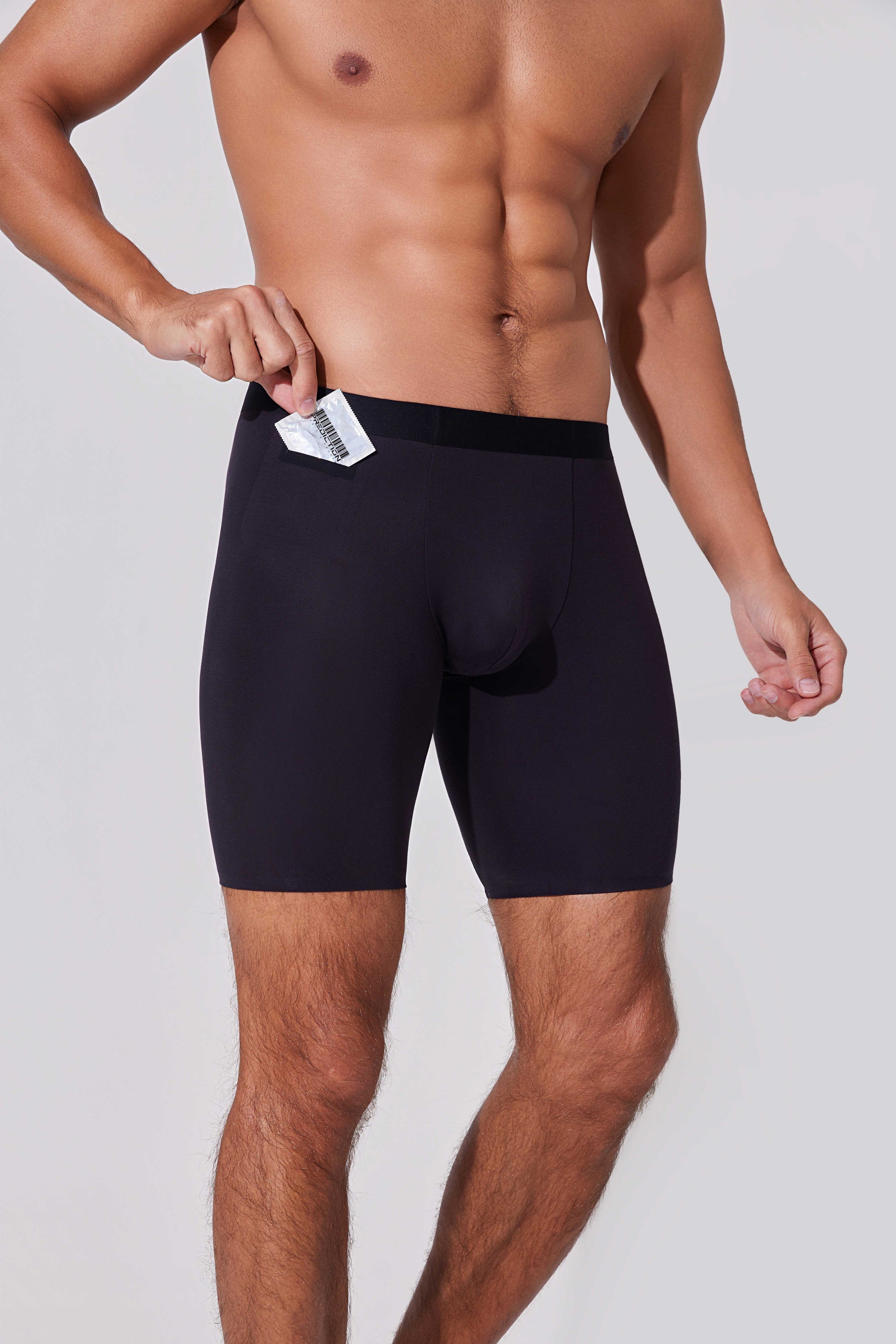 Men’s boxer briefs with dual pocket design holding small item securely