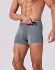 Men’s boxer briefs with hidden pocket holding AirPods for easy access