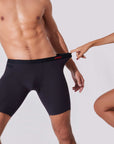 Black boxer briefs with stretch waistband demonstrating flexible fit and comfort
