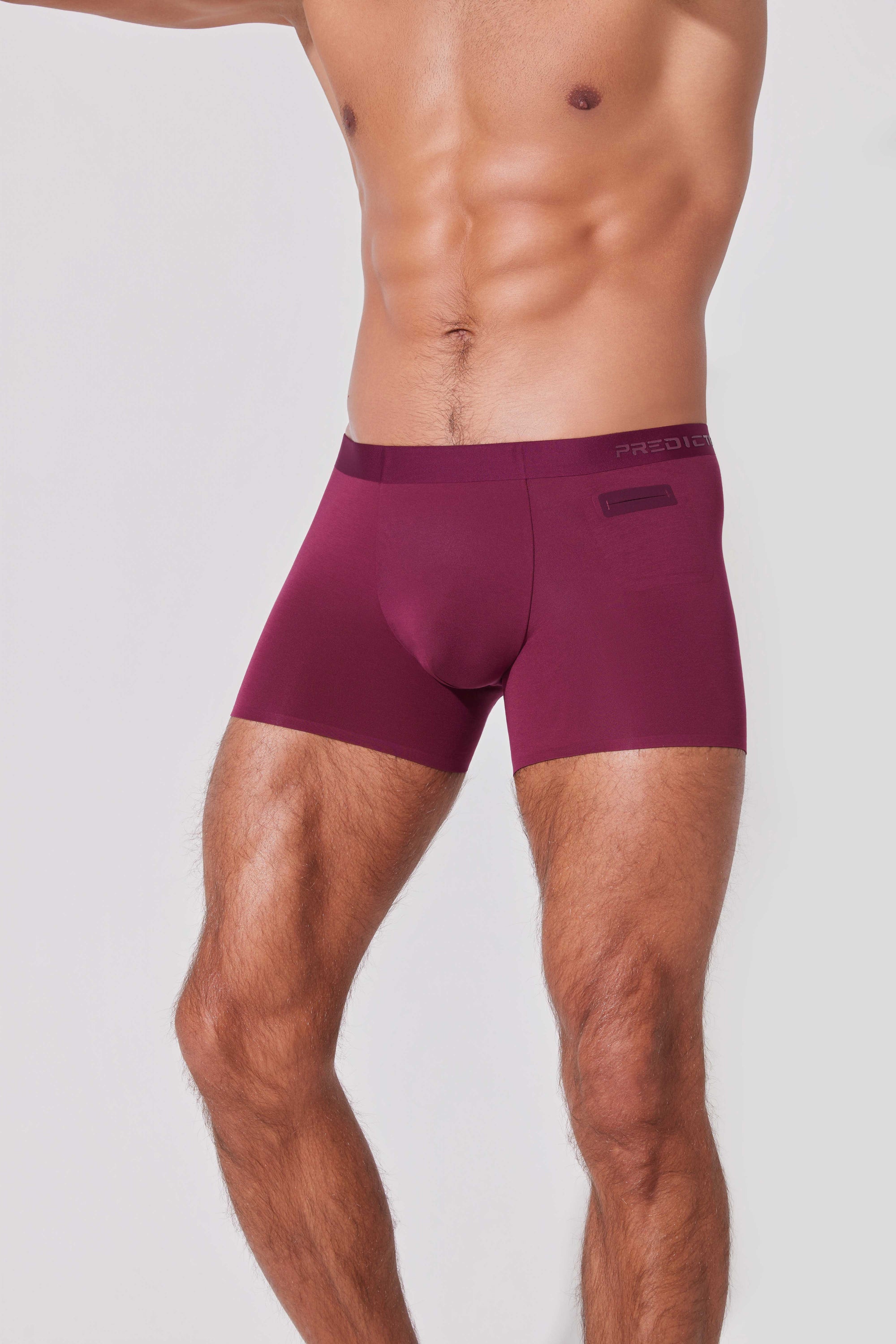 Men’s burgundy boxer briefs with side pocket detail close-up