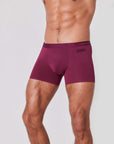 Men’s burgundy boxer briefs with side pocket detail close-up