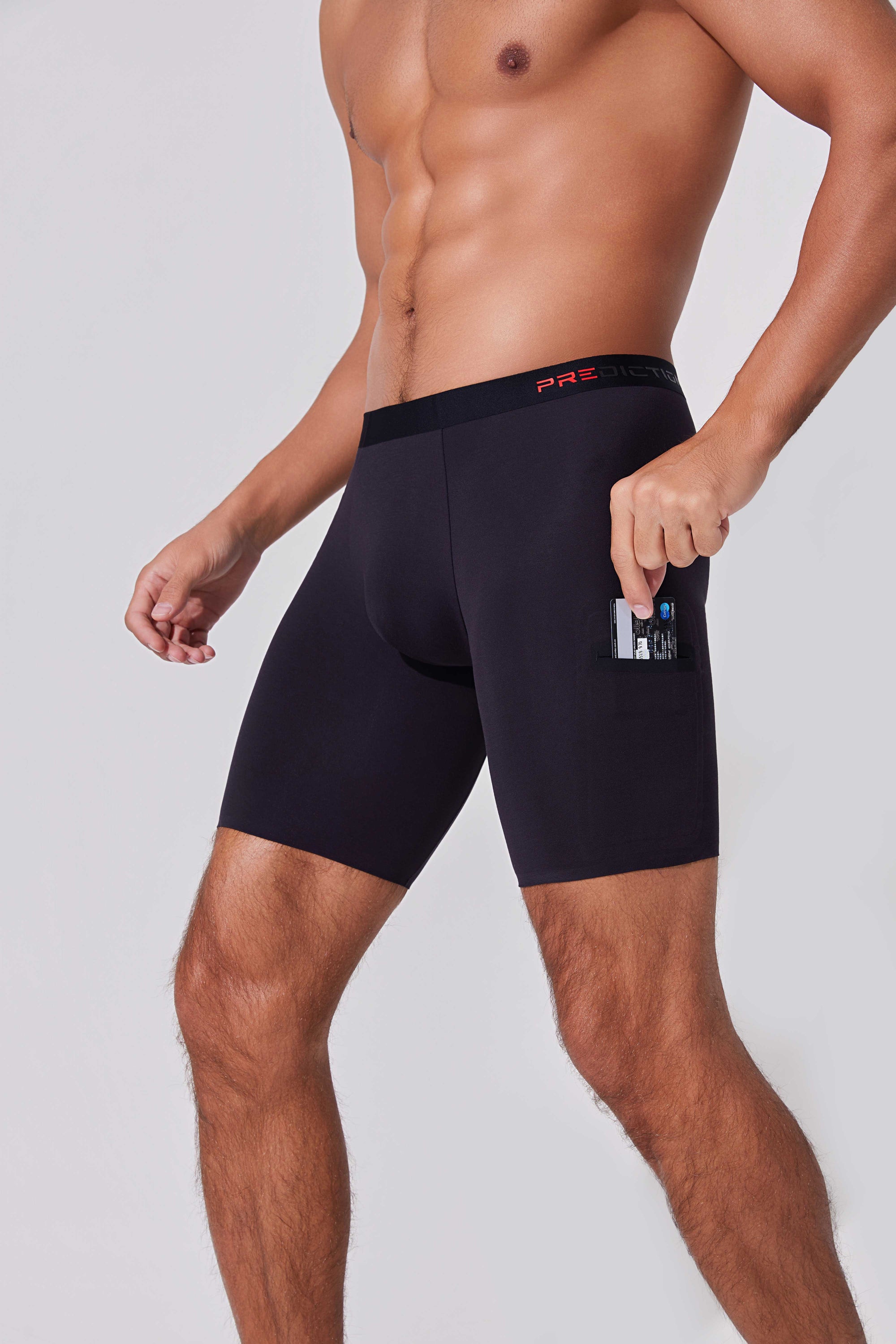 Men’s dual pocket boxer briefs with side pocket holding cards